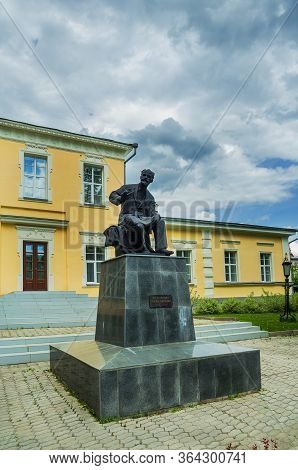 Alapayevsk, Russia - June 15, 2017: View Of The Tchaikovsky House-museum With A Monument To The Grea