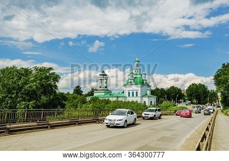 Alapayevsk, Russia - June 15, 2017: View Of The Holy Trinity Orthodox Cathedral  From The Bridge Ove