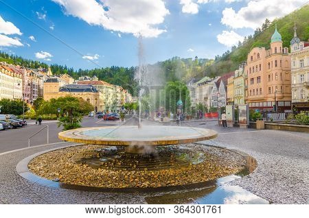 Karlovy Vary, Czech Republic, May 10, 2019: Hot Spring Geyser Vridlo At Carlsbad Historical City Cen