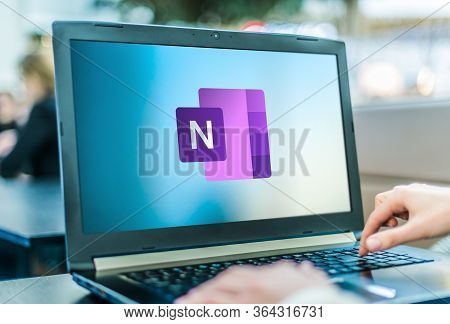 Poznan, Pol - Apr 24, 2020: Laptop Computer Displaying Logo Of Microsoft Onenote Program, Part Of Th
