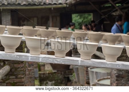 Clay Pottery Drying In Old Traditional Pottery Workshop In Jingdezhen, China