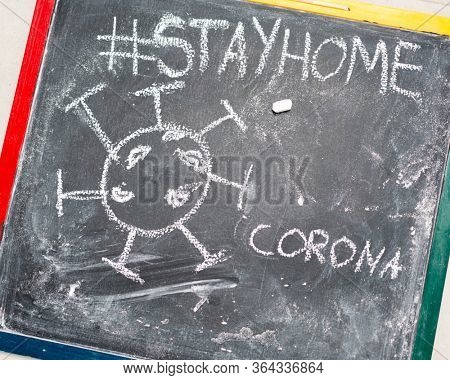 Corona virus sign on blacboard