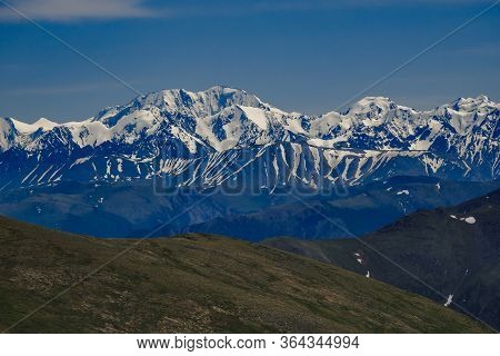 Spectacular View From The Top Of The Mountain To The Mountain Range In The Ulagansky District Of The