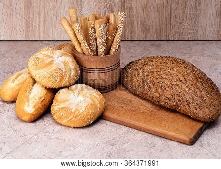 Сrisp Bread With Buns. French Baguettes. Fresh Crispbread. Bread Background. Different Breed  On Woo