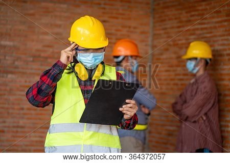 Engineer Women Wear Protective Face Masks For Safety At Construction Site,covic-19 Has Turned Into A
