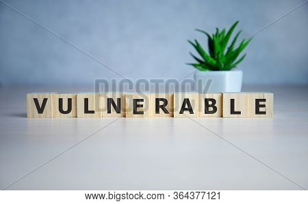 Word Vulnerability On Wooden Cubes, Concept Background