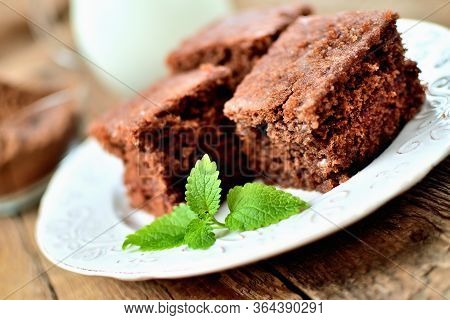 Gingerbread Cakes With Leaves Of Mint. Close-up View.