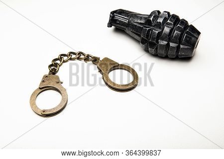 Image Of Handcuffs Pomegranate White Background Studio