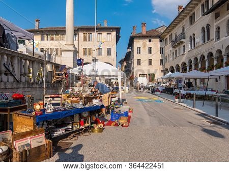 Feltre, Italy - August 11, 2019: Flea Market On Maggiore Square Or Piazza Maggiore In Feltre Town In