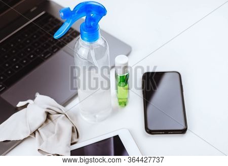 Antibacterial Agent For Cleaning Devices. Smartphone, Tablet, Laptop During A Virus Outbreak.