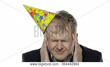 Portrait Of Drank Young Clerk Man With A Hangover Having Headache. Emotions. Disheveled Guy Business