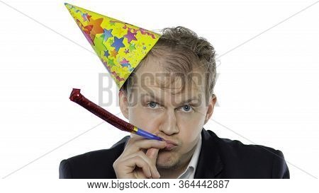Portrait Of Drank Sleepy Young Clerk Man With Hangover Blowing A Whistle. Emotions. Disheveled Guy B