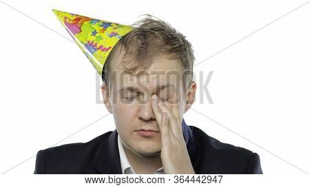 Portrait Of Drank Sleepy Young Clerk Man With A Hangover. Emotions. Disheveled Guy Businessman In Su