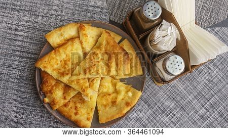 Georgian Dish - Megrelian Khachapuri. As A Filling, Young Imeritin Cheese Is Used. The Salt And Pepe