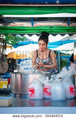 Chef Cooking A Noodle Soup At Street Food Market