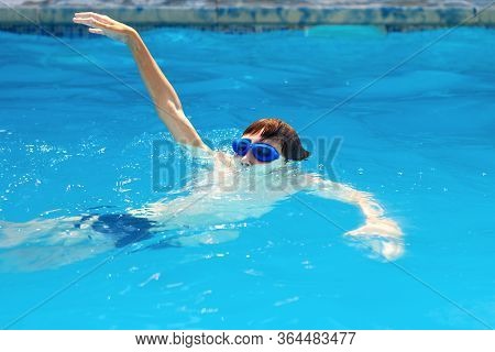 Child Drowning In To The Water And Show Up Hands For Help