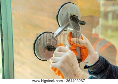 Engineer Use Tool Install Glass In Building Construction Site,building Glass Technician.