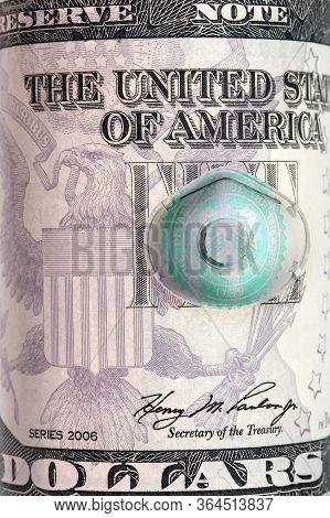 American Dollar Banknote With A Face Mask Particulate Respirator Top View. Covid-19 Sars Coronavirus