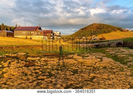 Bukovec Mountain Above Jizerka Village At Sunset Time. Spring In Jizera Mountains, Czech Republic.