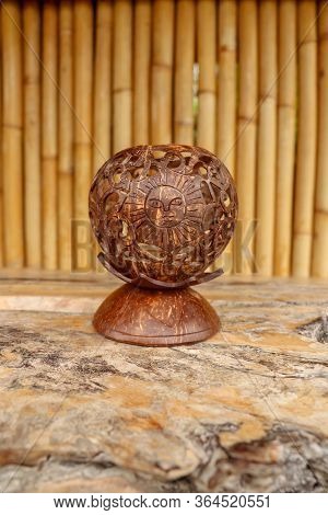 Coconut Shell Carving. Handicraft Of Indigenous People In Bali, Indonesia. Shelve With Balinese Souv