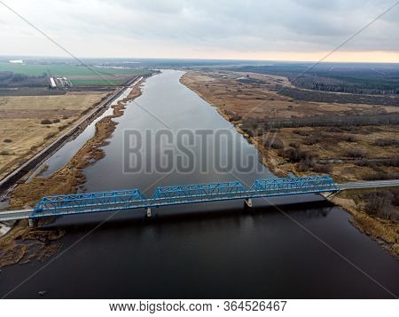 Aerial Panoramic View From Above To The Bridge Over The River Lielupe Near Kalnciems, Latvia