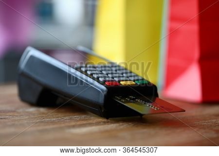 Close-up Of Terminal With Plastic Credit Card. Cashier Machine To Withdrawals Money. Nfc Technology 