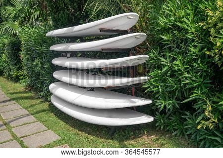 Surfboards On The Beach At The Surf School