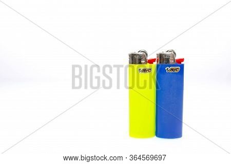 Miercurea Ciuc, Romania- 04 May 2020: Two Colorful Bic Cigarette Lighters Isolated On White Backgrou