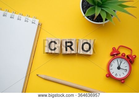 Modern Marketing Buzzword Cro - Conversion Rate Optimisation. Top View On Wooden Table With Blocks. 