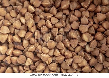 Buckwheat Groats Close-up, Macro. Buckwheat Natural Pattern. Diet And Healthy Nutrition Concept