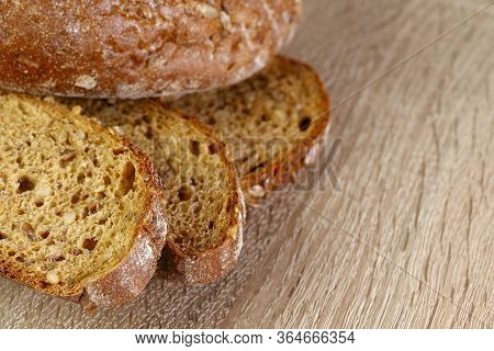 Natural Background.beautiful Slices Of Cereal Bread On A Wooden Surface.top View On Slices Of Bread.