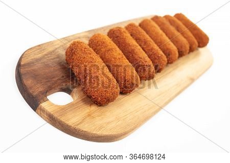 Brown Crusty Dutch Kroketten On A Serving Tray, Isolated On A White Background