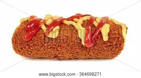 Brown Crusty Dutch Kroket With Mustard And Ketchup Topping Isolated On A White Background
