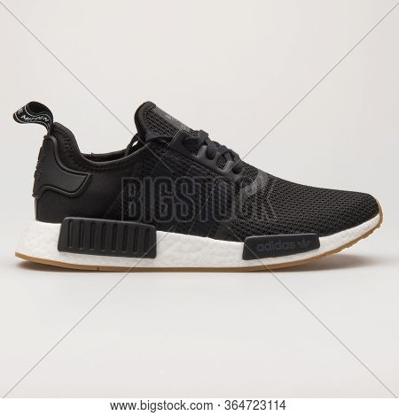 Vienna, Austria - May 27, 2018: Adidas Nmd R1 Black And White Sneaker On White Background.