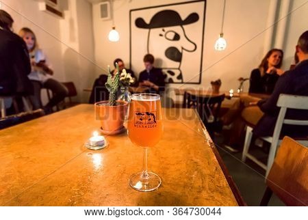 Copenhagen, Denmark: Craft Beer Bar With Drinking People With Glasses By Danish Mikkeller Brewery, W