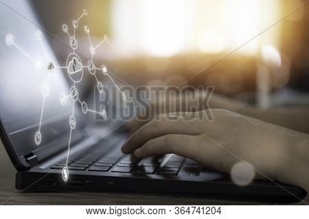 Virtual Cloud And Icon With Hand Use Laptop To Download And Upload Technology Information. Technolog