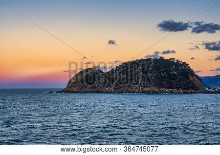 Getaria Mouse At Sunset With Lighthouse Light