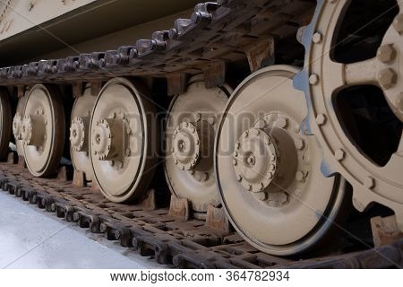 Low Angle View Of Up Of Tank Tracks