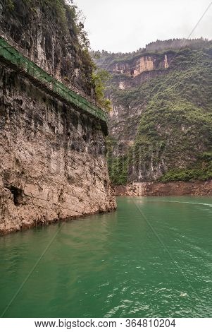 Wuchan, China - May 7, 2010: Dawu Or Misty Gorge On Daning River. Longer Shot Of Plank Pathway With 