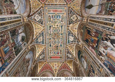 Siena, Italy - 13, March, 2018: Wide Angle Picture Of The Painted Ceiling Of Piccolomini Library Loc