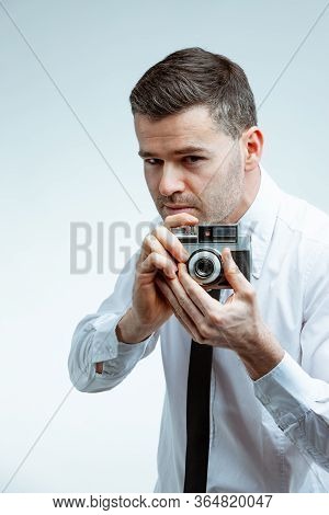 Handsome Man With Vintage Camera