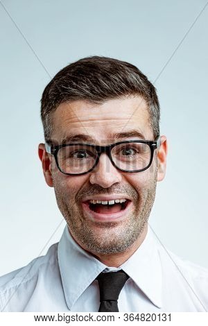 Crazy Laughing Businessman In Glasses
