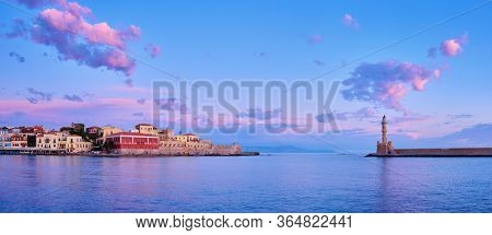 Panorama of picturesque old port of Chania is one of landmarks and tourist destinations of Crete island in the morning on sunrise. Chania, Crete, Greece