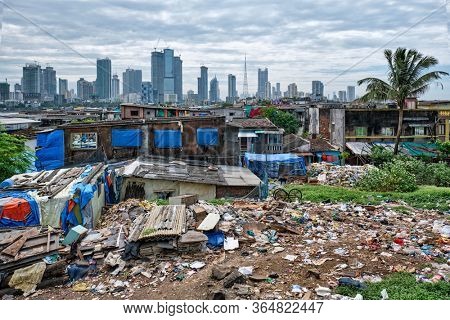 View of Mumbai skyline with skyscrapers over slums in Bandra suburb. Mumbai, Maharashtra, India