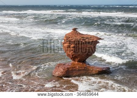 The Teacup rock, named for the resemblence to a cup and saucer, in Thunder Cove beach, Prince Edward Island, Canada