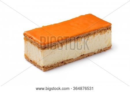 Single traditional Dutch orange Tompouce pastry for kings day isolated on the background