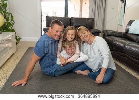 Covid-19 Stay At Home, Save Lives. Family In Staying Home Happy To Stop The Coronavirus Spreading.
