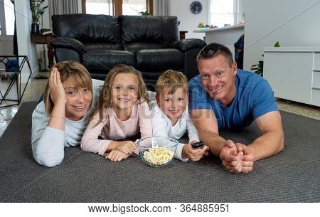 Covid-19 Stay At Home, Save Lives. Family In Staying Home Happy To Stop The Coronavirus Spreading.