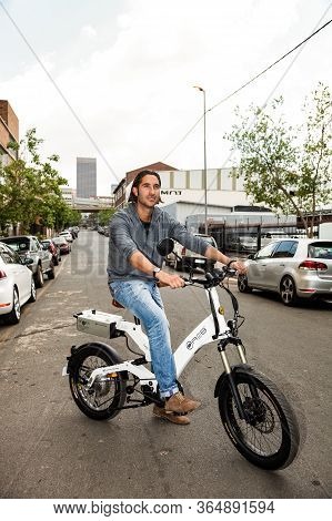 Real Estate Mogul, Jonathan Liebman Riding A Battery Powered Electric Bike On Streets Of Maboneng Pr