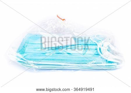 Bag Of Disposable Personal Protective Masks. Written In French Disposable Anti-projection Mask (masq